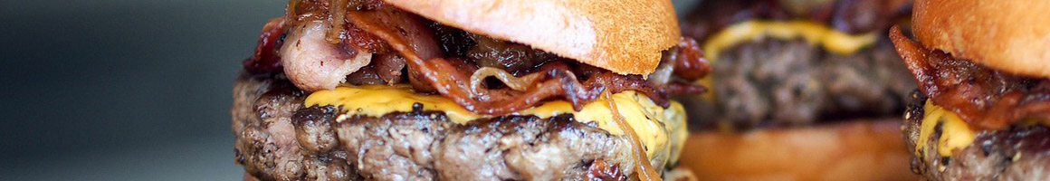 Eating American (New) Burger at Freddy's Frozen Custard & Steakburgers restaurant in West Valley City, UT.